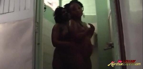  Hot ebony chicks are kissing lustfully in the bathroom